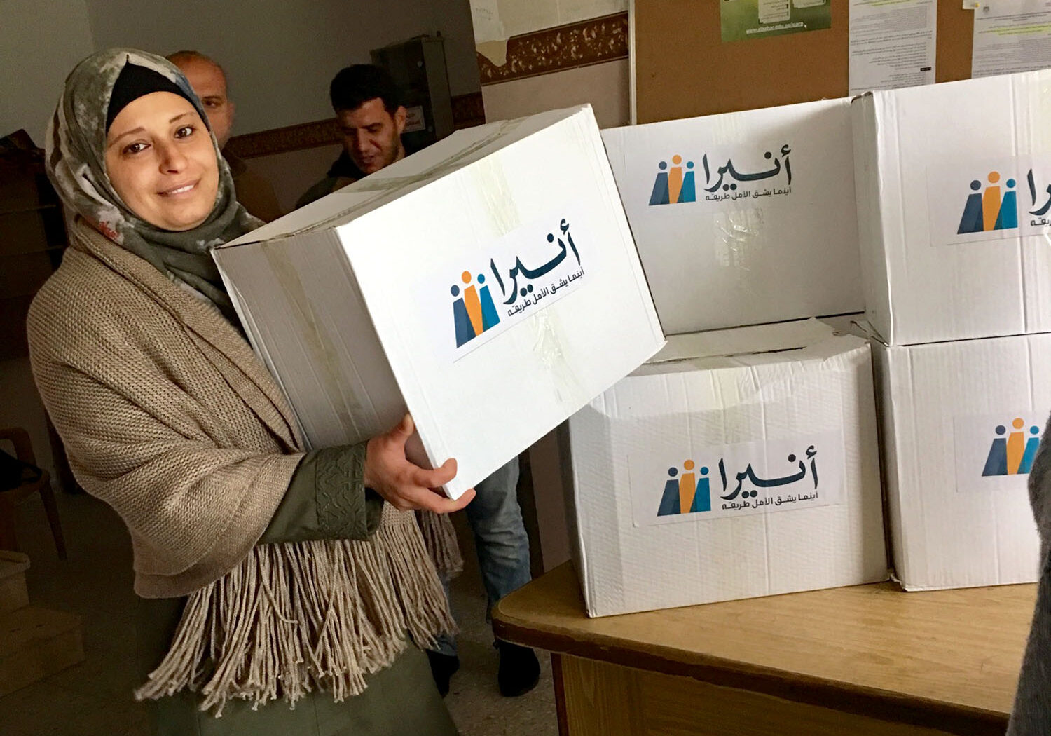 As part of Anera's public health program, donated hygiene kits are distributed to attendees.