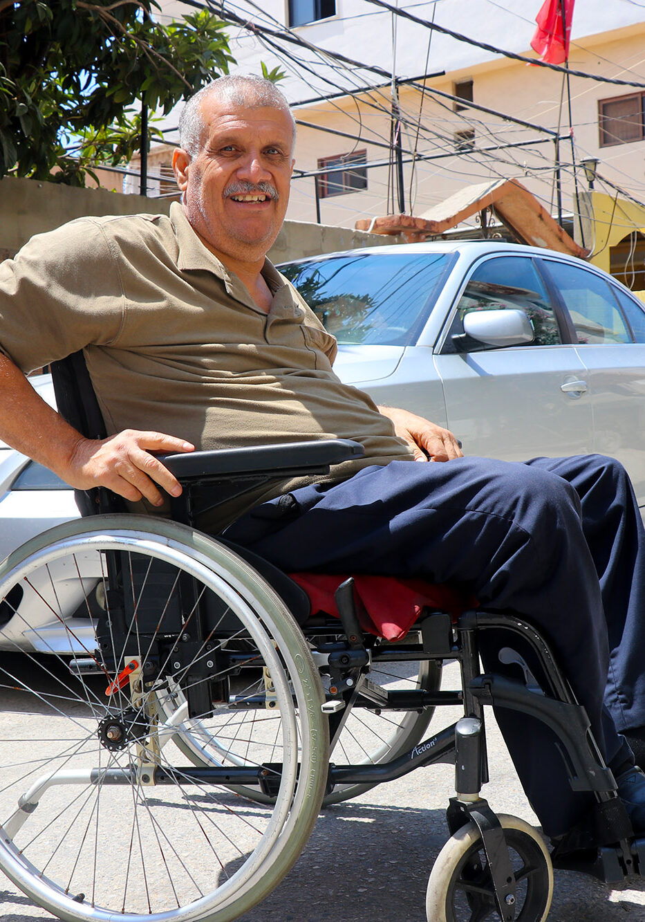 Ismael in his new wheelchair thanks to Anera and Wheels to Heal.