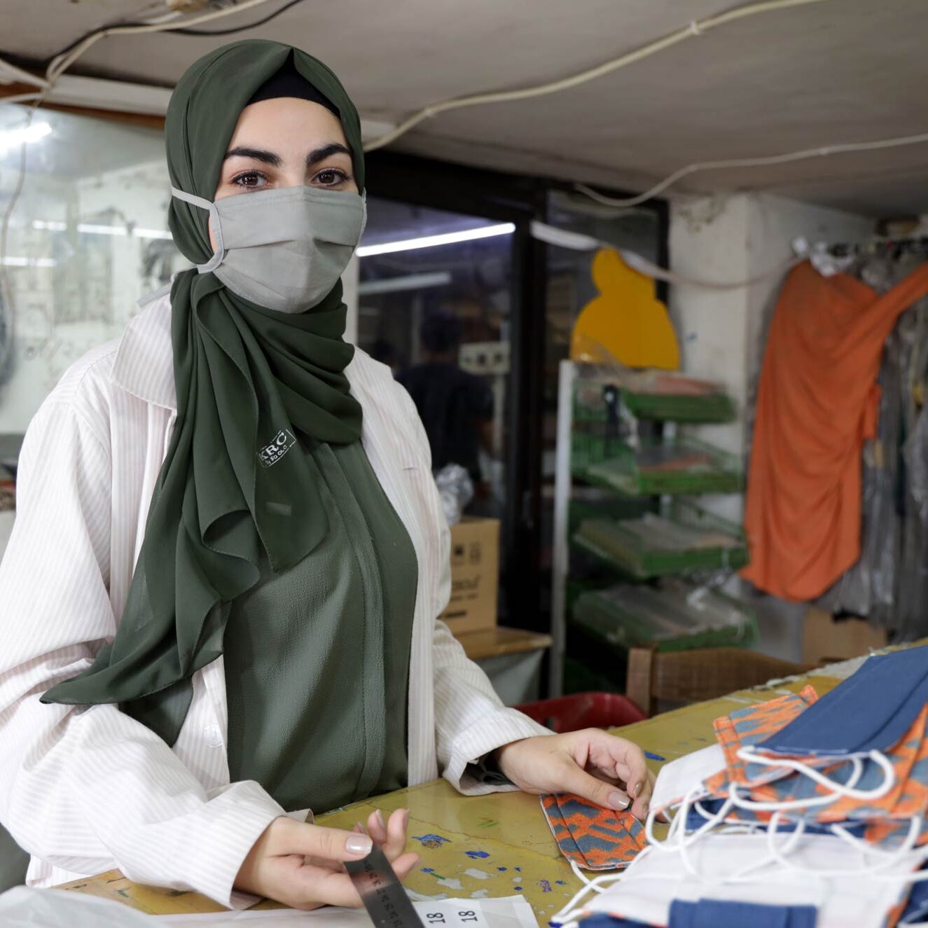 Mariam at her work station