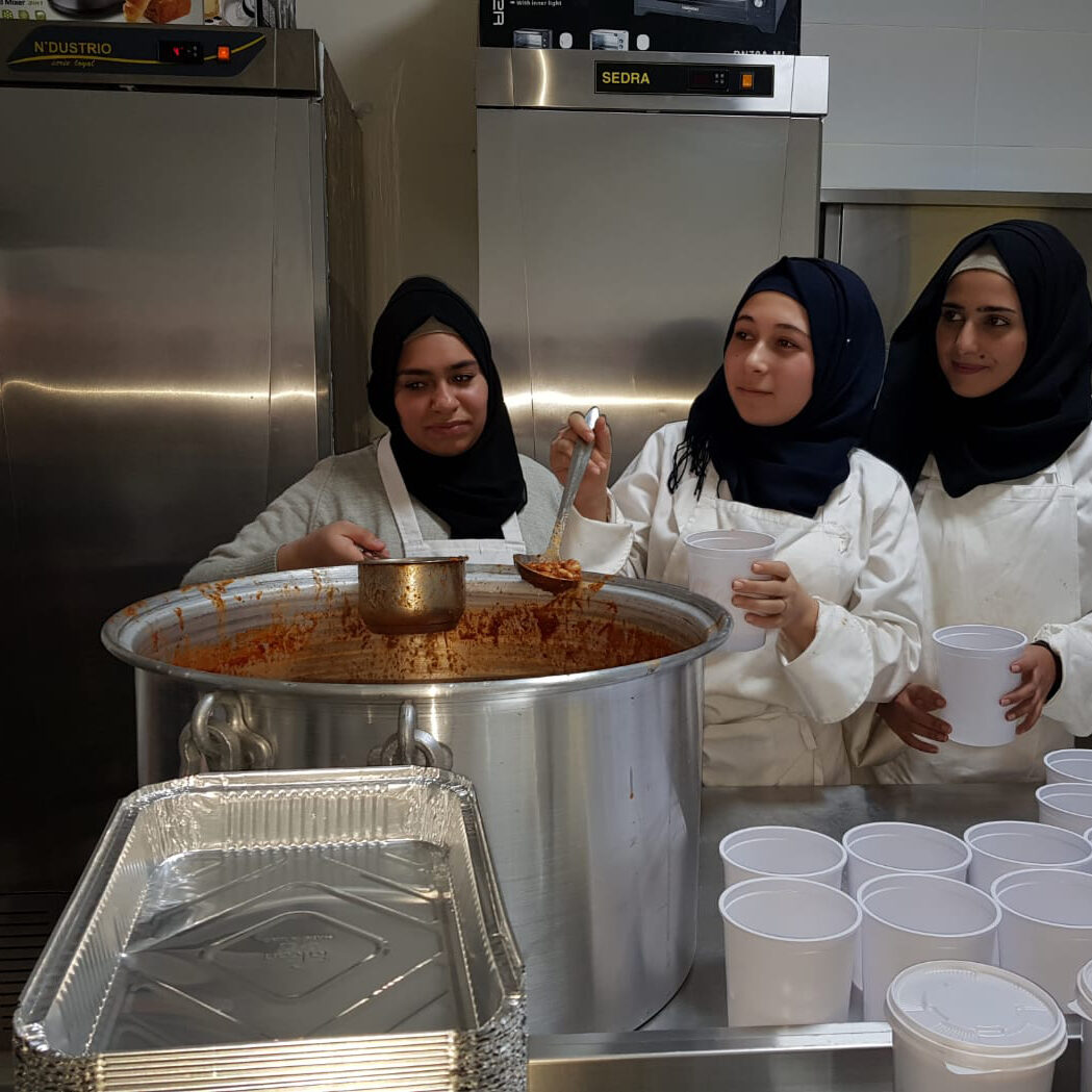 Our cooking and vocational course students preparing meals for vulnerable families in Lebanon. (2)