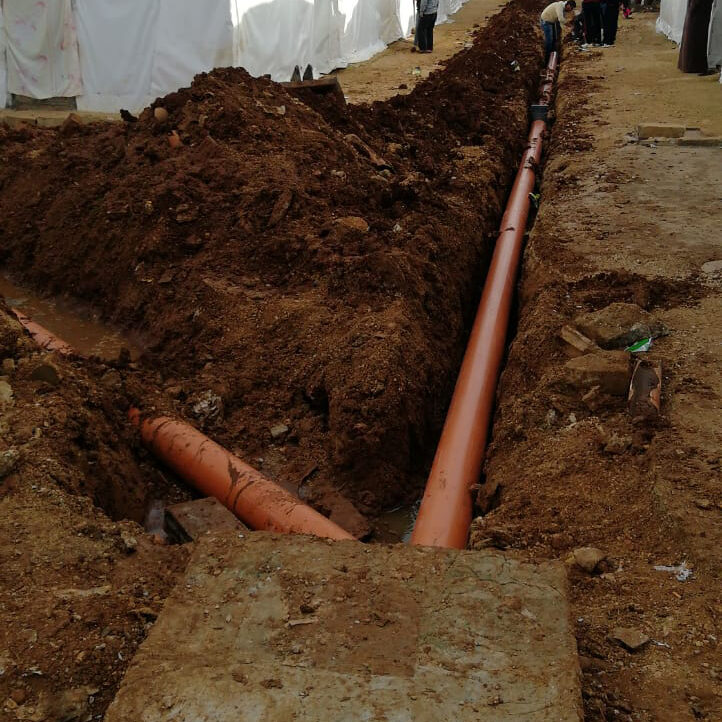 Students from Anera's vocational training courses in plumbing installed a network of pipes in Rihanye camp for Syrian refugees in Lebanon. (2)