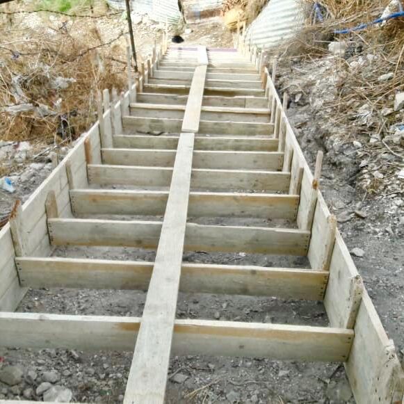 Frames built to pour concrete to mold the stairs.