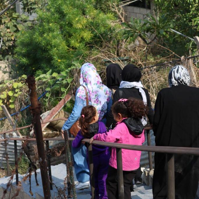 Residents of Ein El Hilweh using the newly built staircase.